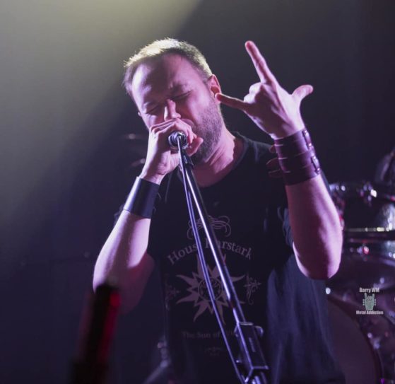 Jarlaath from Penumbra singing in concert